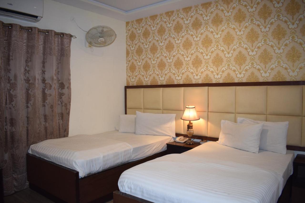 Hotel Pak Continental Мултан Экстерьер фото